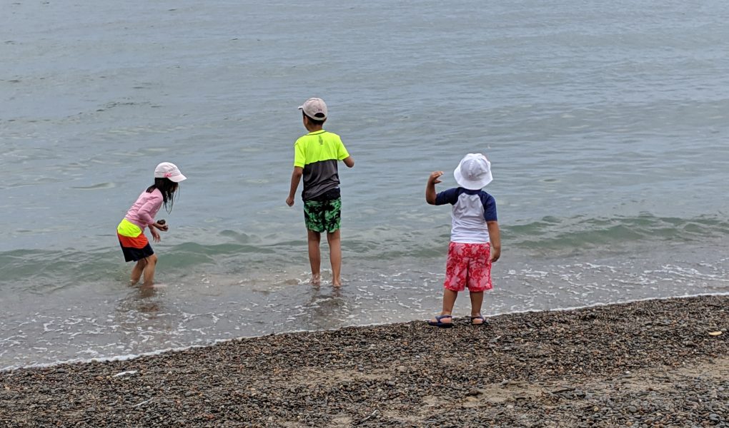 kids playing at the beach